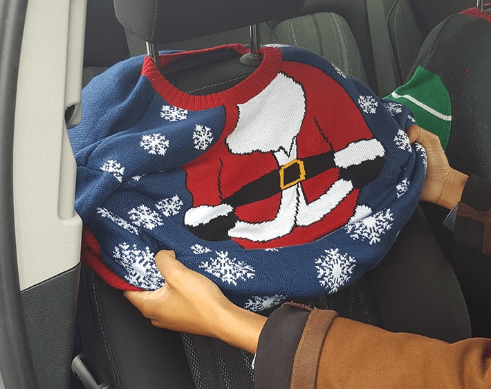 Pull sweater over the seat