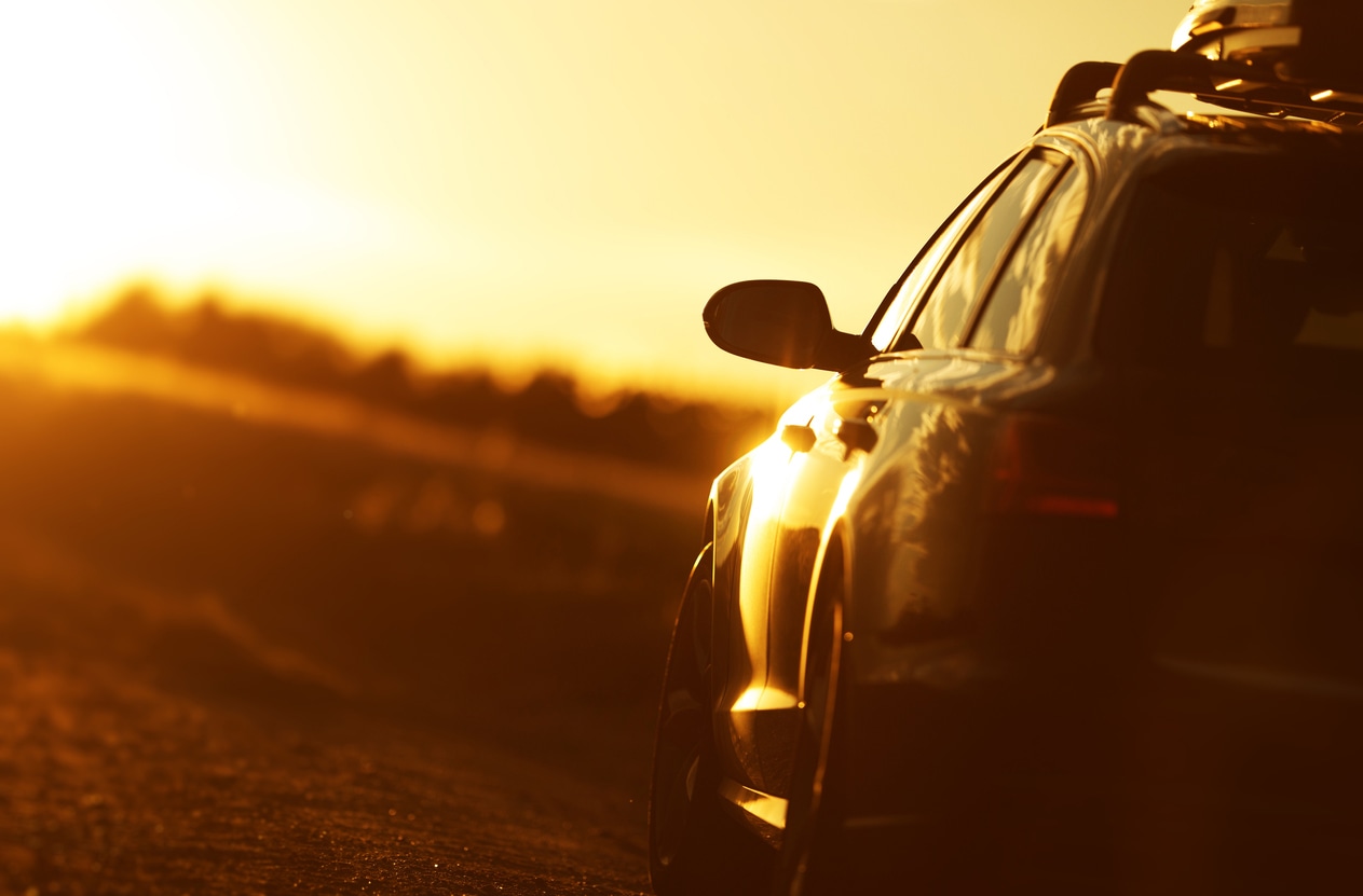 image of a car at sunset