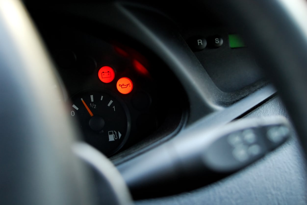 check oil warning light on car dashboard